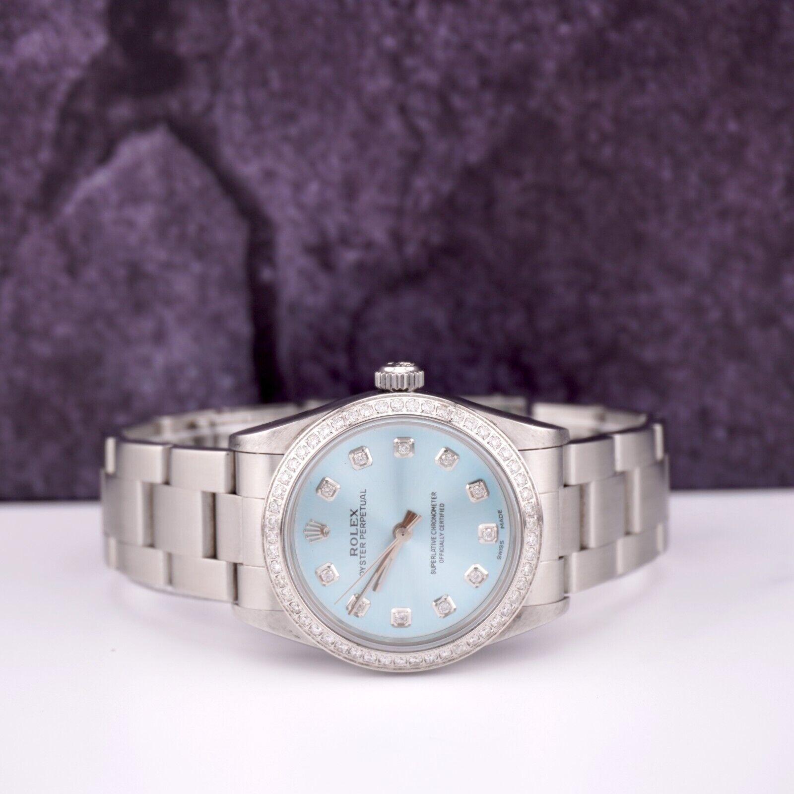 Rolex Oyster Perpetual 31mm Watch customized with 1.75 carats of Genuine Diamonds. The Entire Watch Is Genuine Only Custom Diamond Dial and Bezel is added. The entire bezel and Dial have been beautifully handset in white 