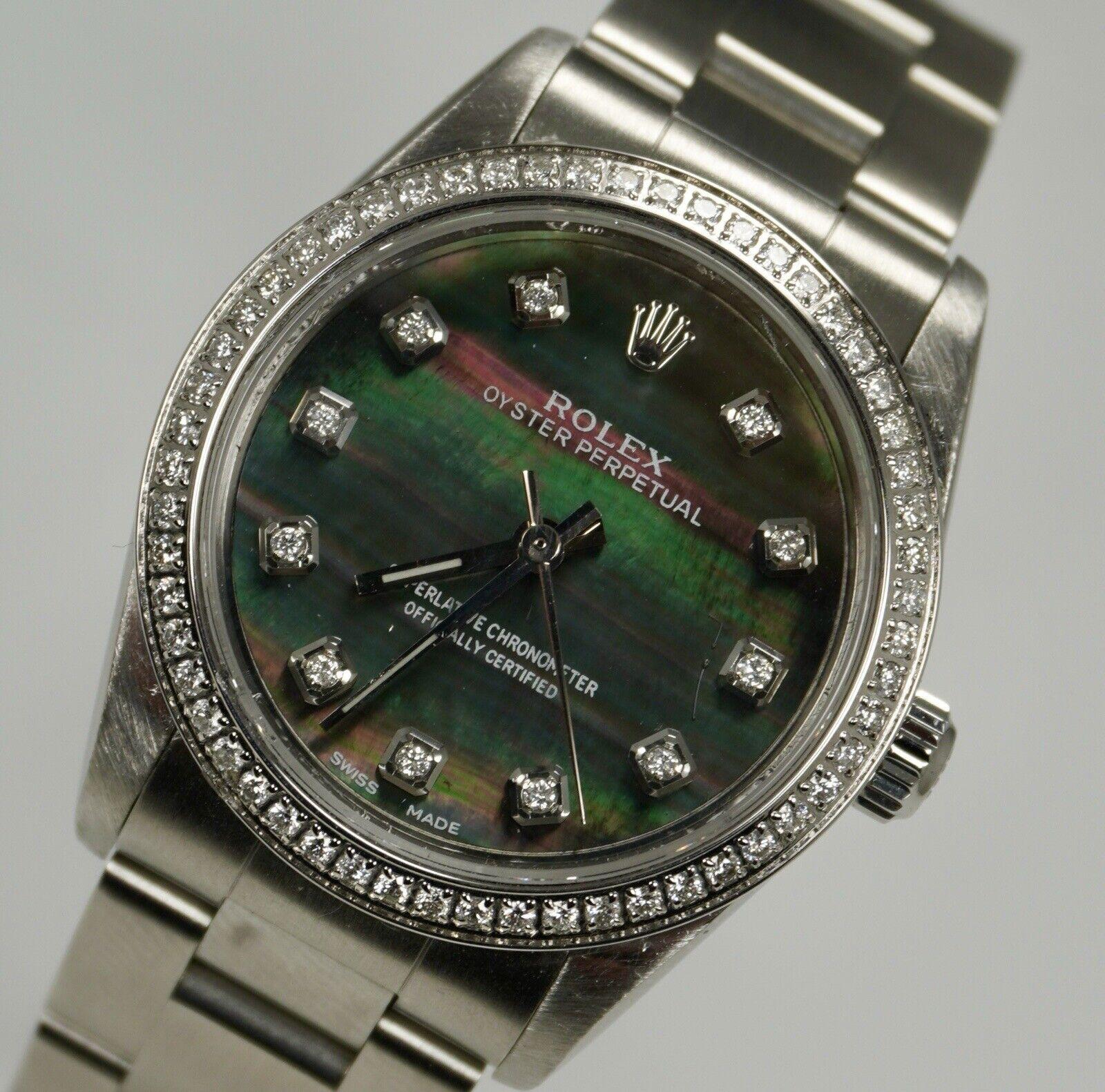 Rolex Oyster Perpetual 31mm Watch customized with 1 carats of Genuine Diamonds! The entire bezel has been beautifully handset in white 