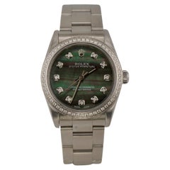Reloj Rolex Oyster Perpetual 31mm 1ct Diamantes Esfera Negra MOP 77080