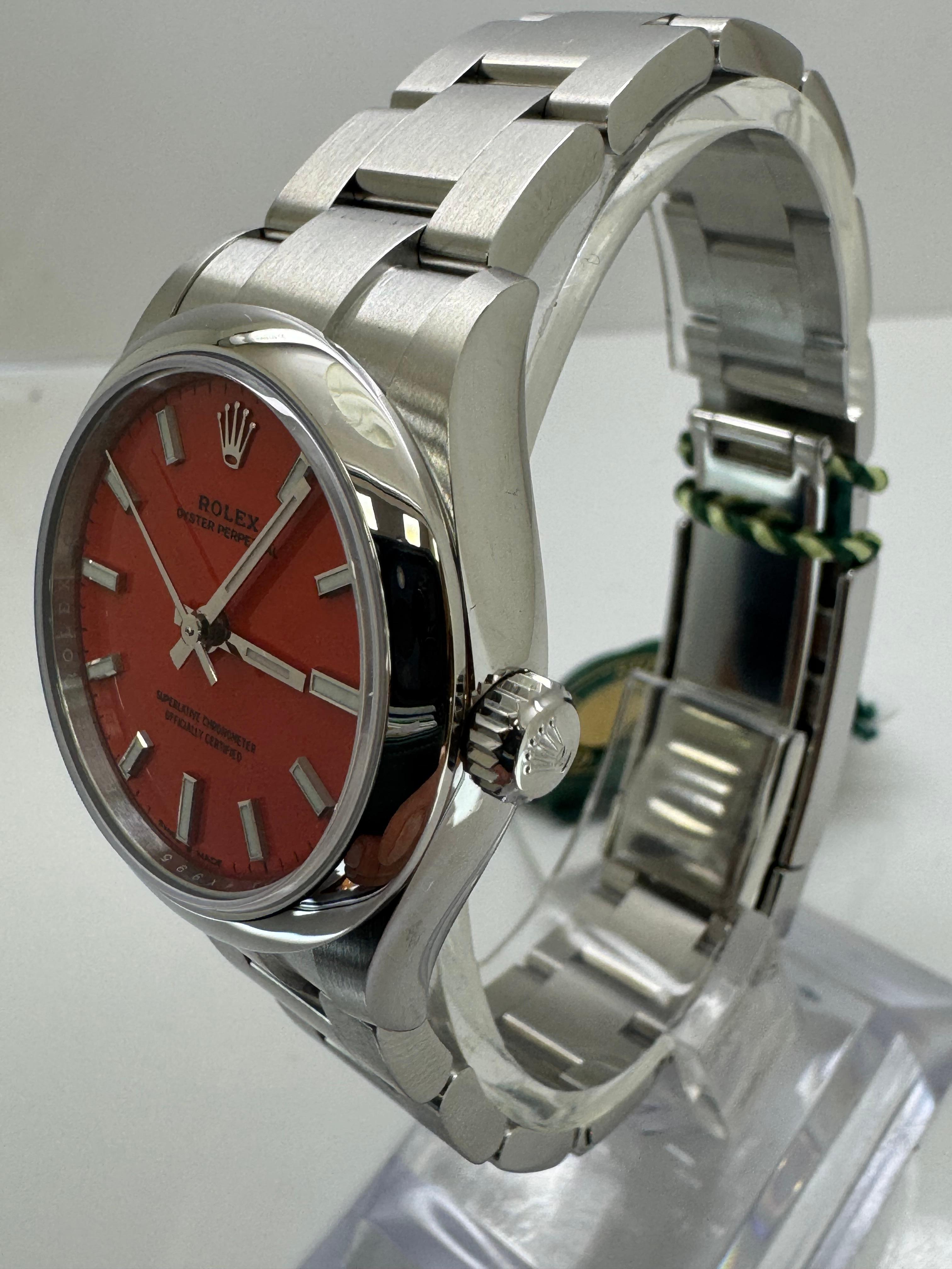 Rolex Oyster Perpetual 31mm Coral Red Dial 277200 – Brand New

Model: 277200
Case Size: 31mm
Case Material: Stainless Steel (Oystersteel)
Dial: Coral Red
Bracelet: Oyster Bracelet – Stainless Steel
Movement: Automatic (Perpetual, mechanical,