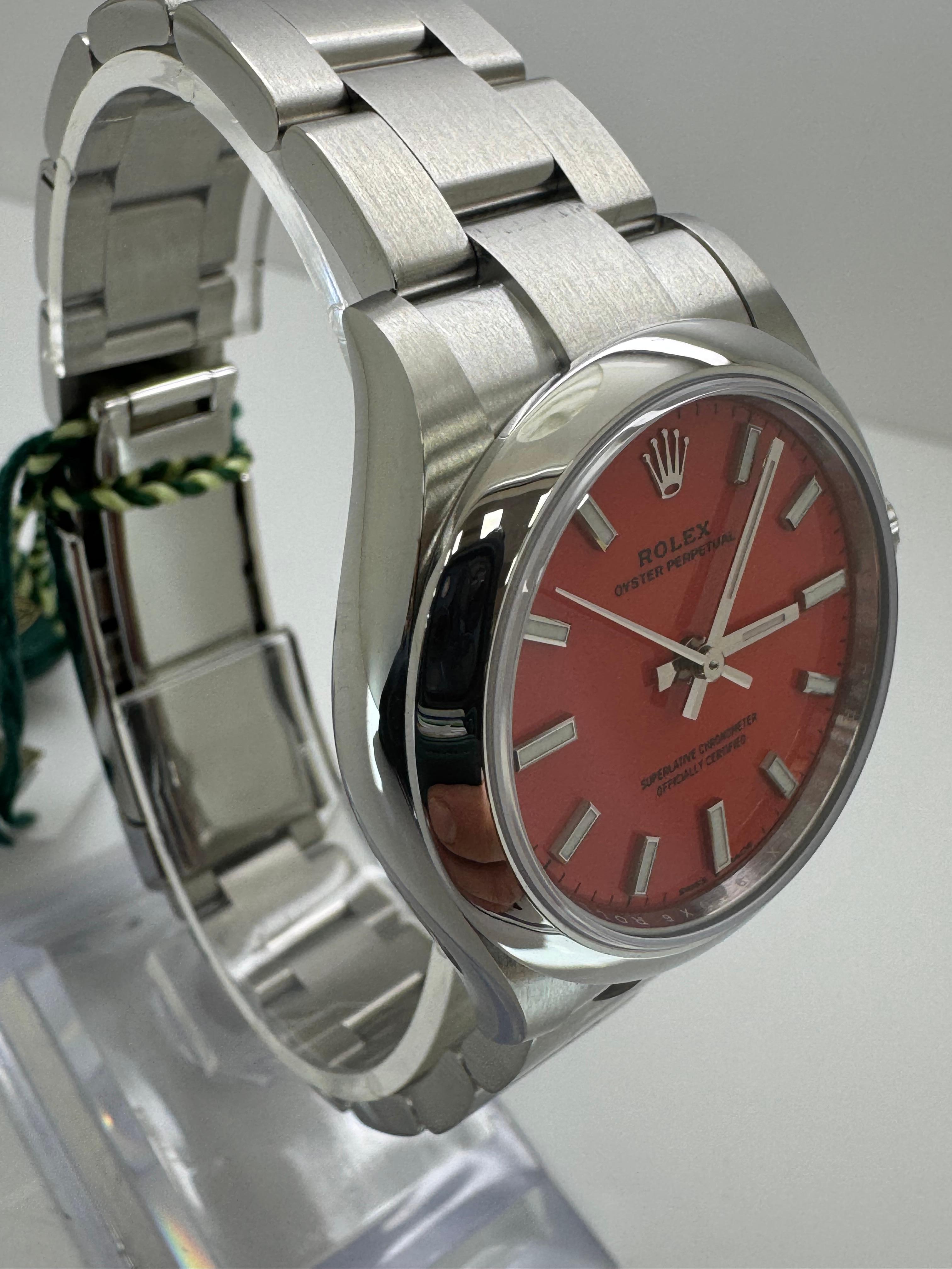 Rolex Oyster Perpetual 31mm Coral Red Dial 277200 – Brand New In New Condition For Sale In New York, NY