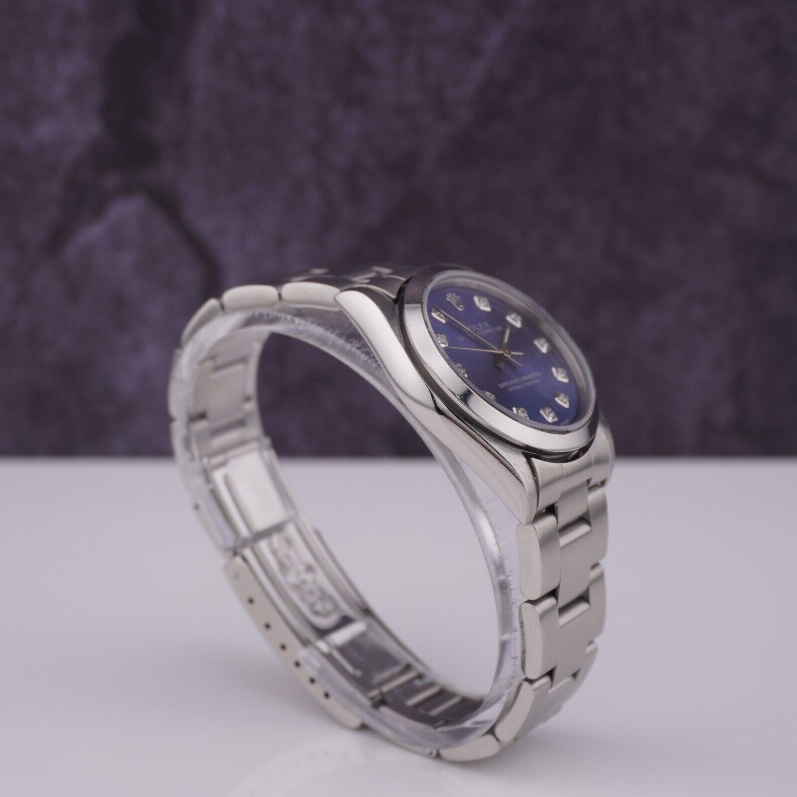 Rolex Oyster Perpetual 31 mm en acier inoxydable avec cadran bleu 77080 Pour femmes en vente