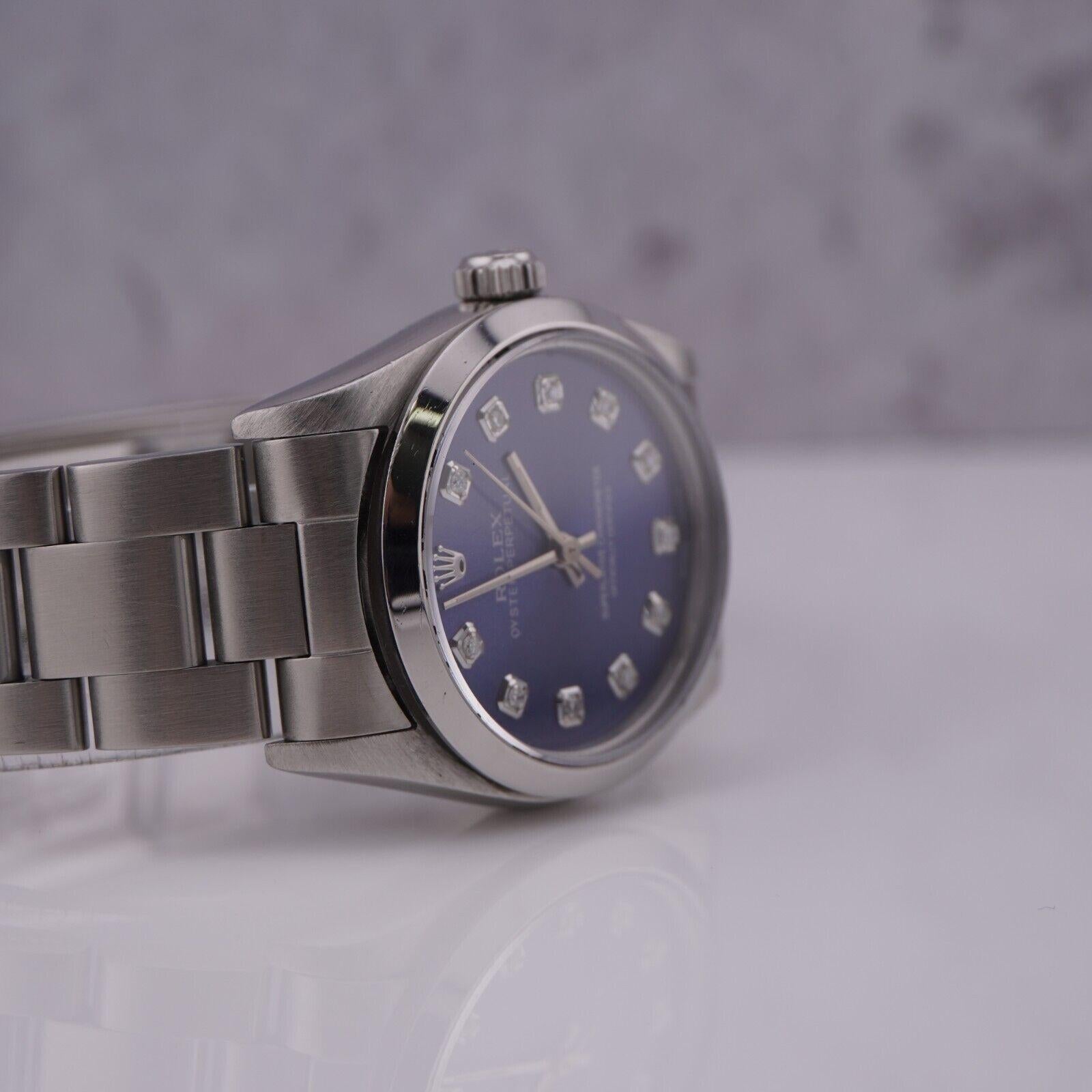Round Cut Rolex Oyster Perpetual 31mm Stainless Steel Blue Dial Watch 77080 For Sale
