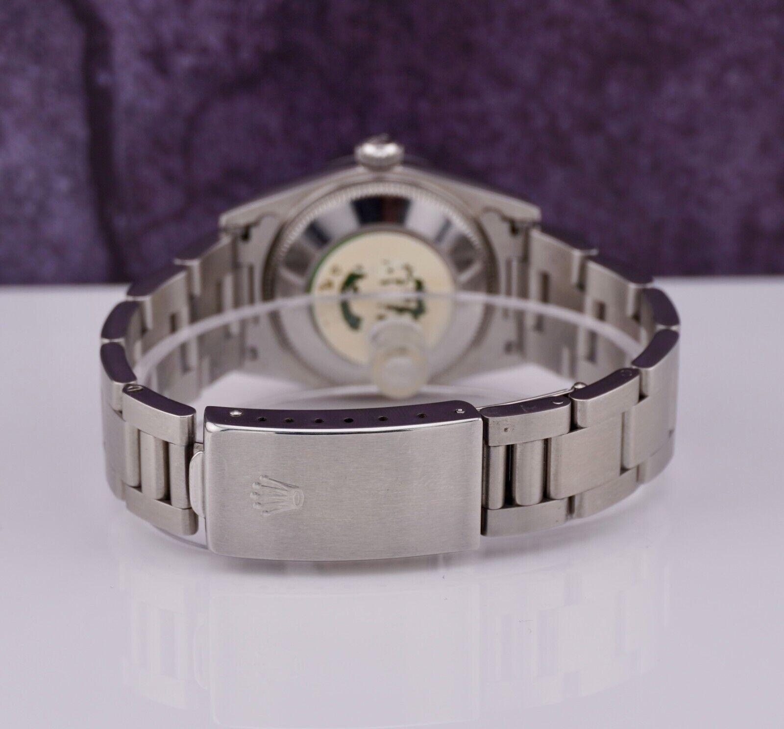 Modern Rolex Oyster Perpetual 31mm Stainless Steel Pink Dial Watch Ref 77080 For Sale