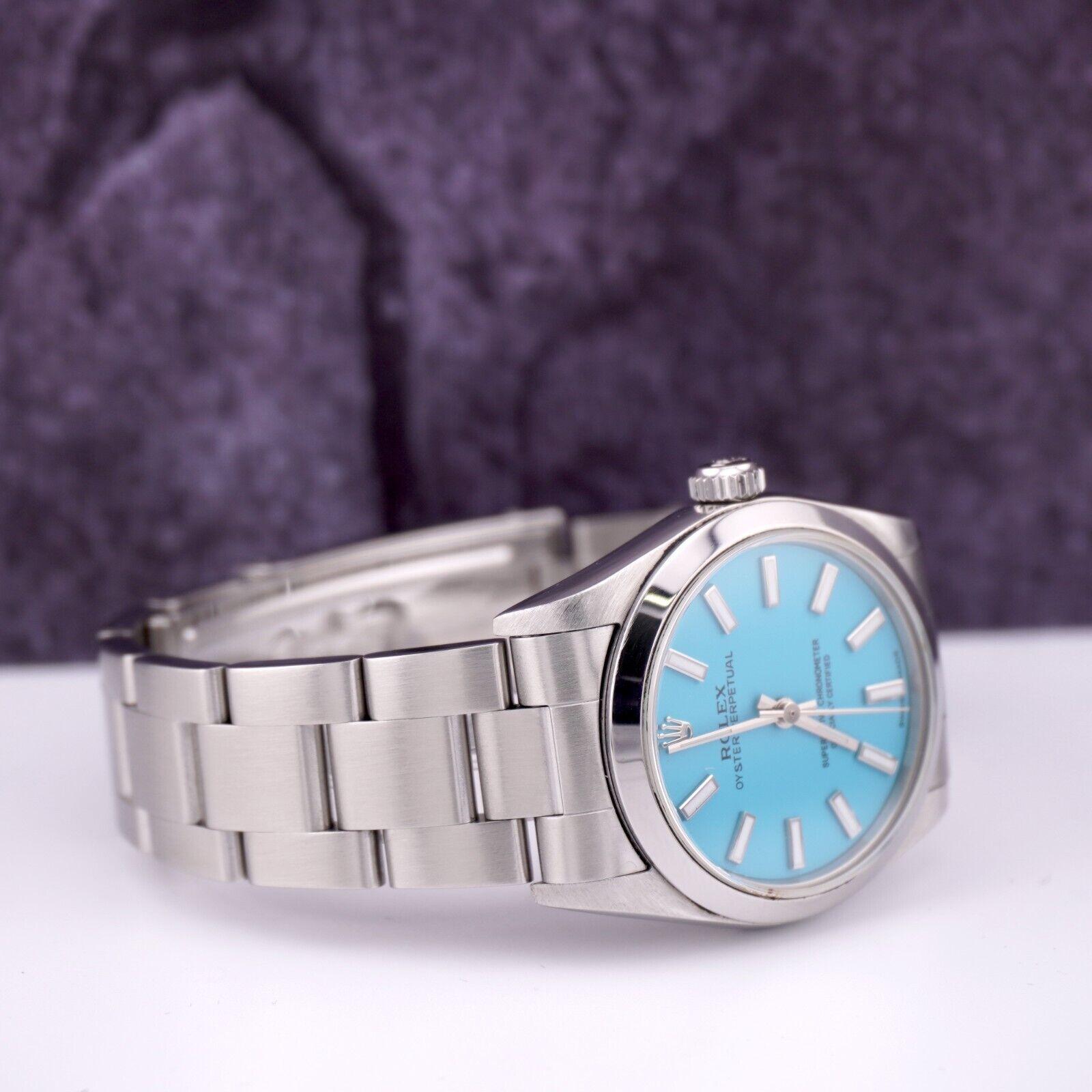 Reloj Rolex Oyster Perpetual 31mm Acero inoxidable Esfera Azul Tiffany Ref 77080 Moderno en venta