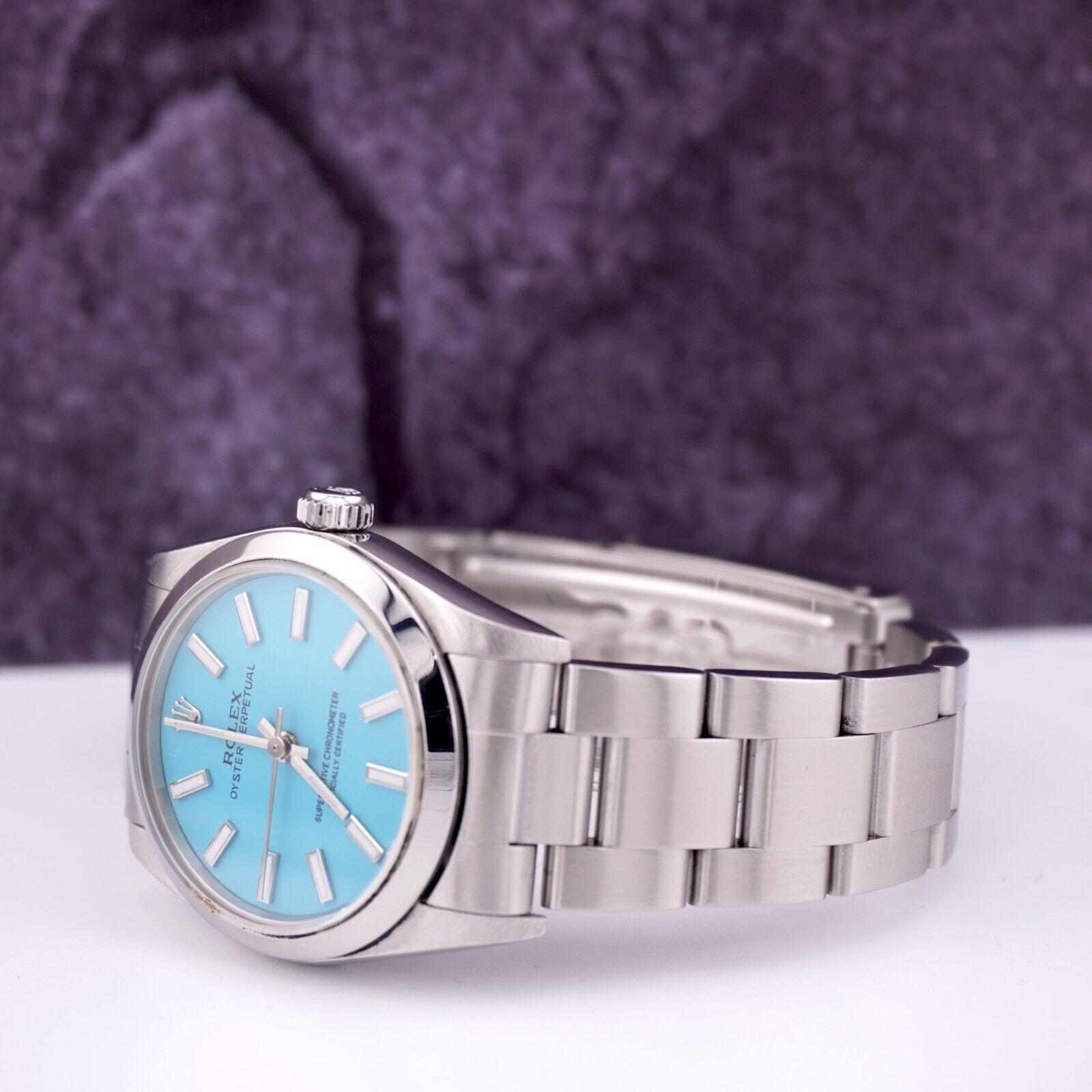 De las mujeres Reloj Rolex Oyster Perpetual 31mm Acero inoxidable Esfera Azul Tiffany Ref 77080 en venta