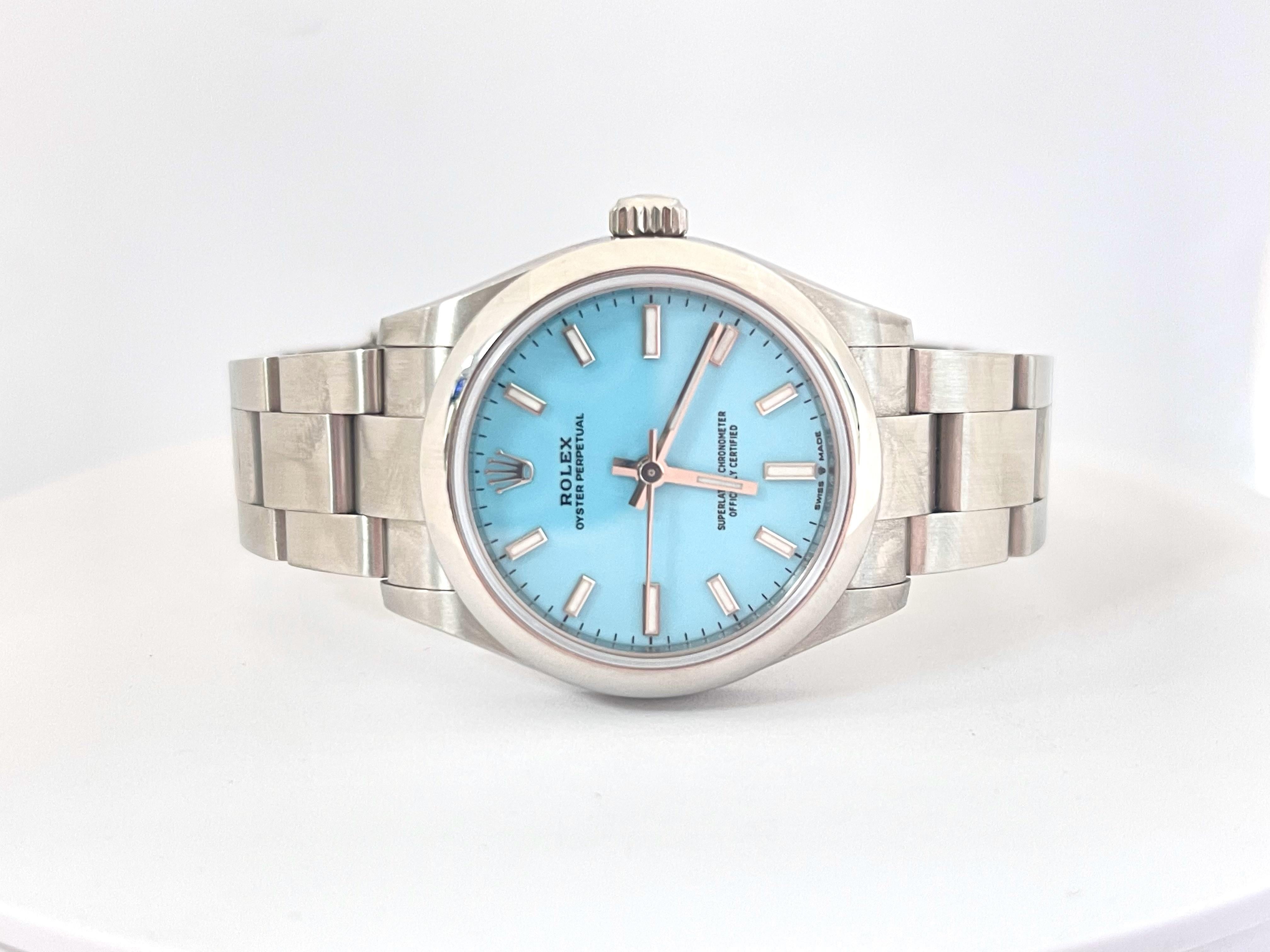 Rolex Oyster Perpetual 31mm Turquoise Blue Dial Steel Watch 277200. This watch is one of the most desirable colors in this category. Brand new never been used with a white tag attached. 

*Free Shipping within the U.S.*
