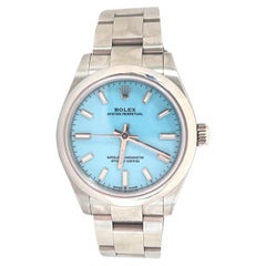 Rolex Oyster Perpetual 31mm Turquoise Blue Dial Steel Watch 277200