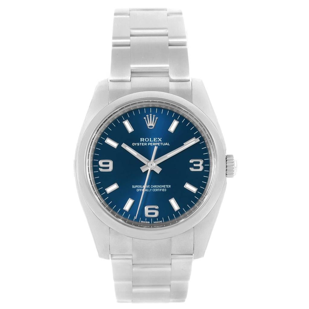 Rolex Oyster Perpetual 34 Blue Dial Oyster Bracelet Watch 114200 Unworn. Officially certified chronometer automatic self-winding movement. Stainless steel case 34.0 mm in diameter. Rolex logo on a crown. Stainless steel smooth domed bezel. Scratch