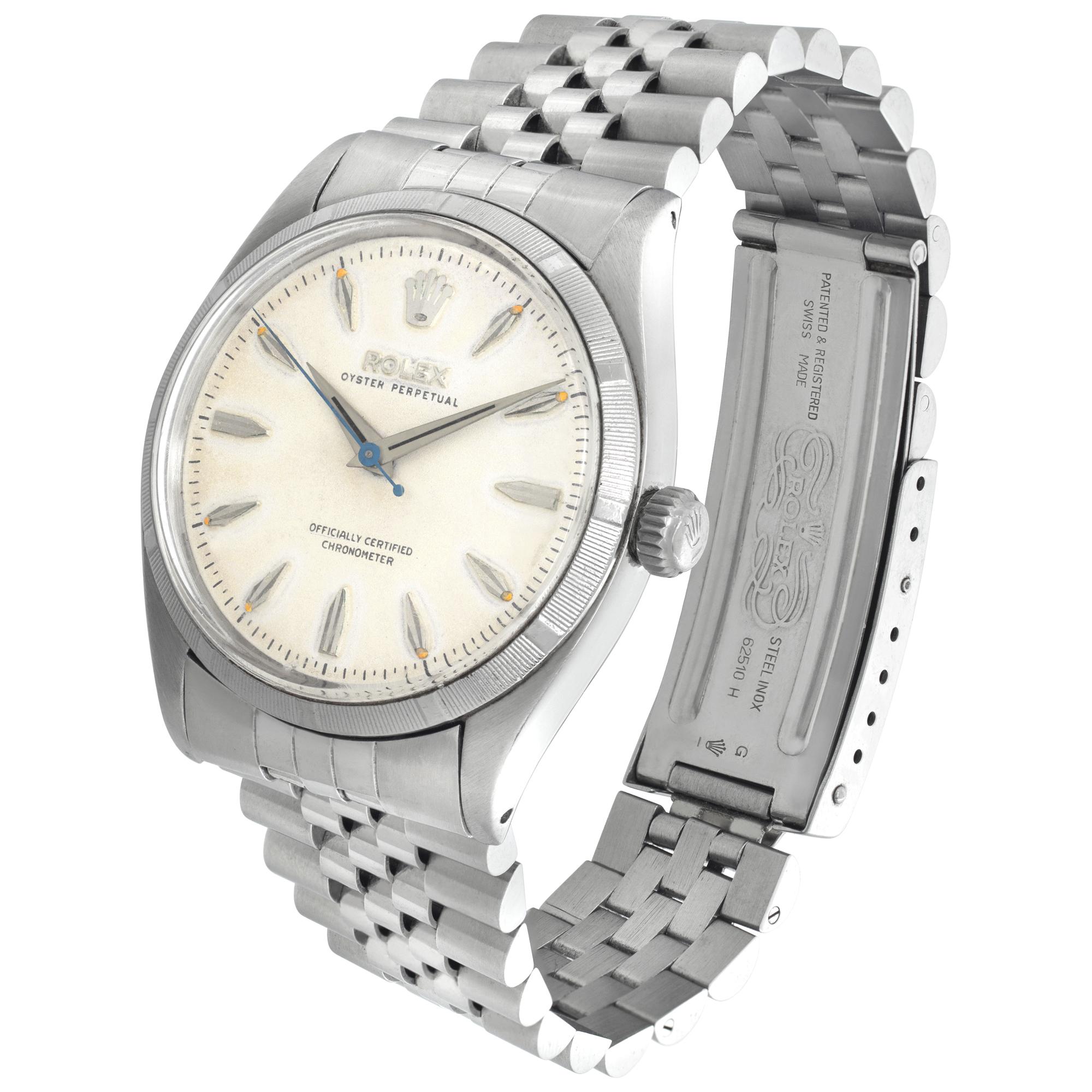 Vintage Rolex Oyster Perpetual in stainless steel with refinished dial and added modern Jubilee bracelet. Auto w/ sweep seconds. 34 mm case size. Ref 6565. Circa 1955 *Bank Wire Only At This Price** Fine Pre-owned Rolex Watch.

 Certified preowned