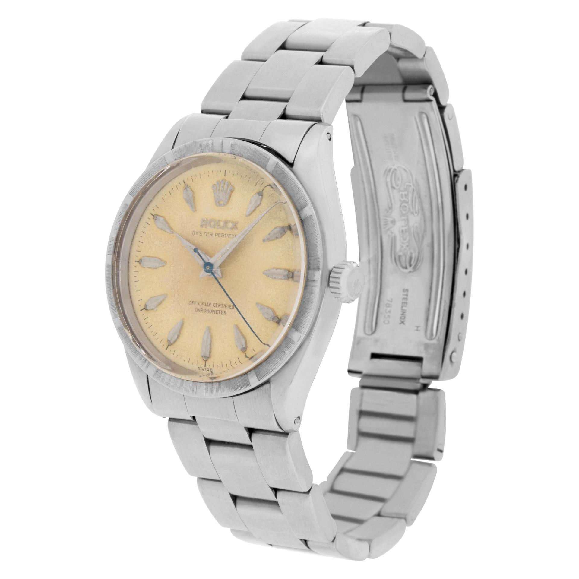 Vintage Rolex Oyster Perpetual with engine-turned bezel with cream dial & baton hour markers. Auto w/ sweep seconds. 34 mm case size. Ref 6569. Circa 1943. **Bank Wire Only at this price** Fine Pre-owned Rolex Watch.

Certified preowned Vintage