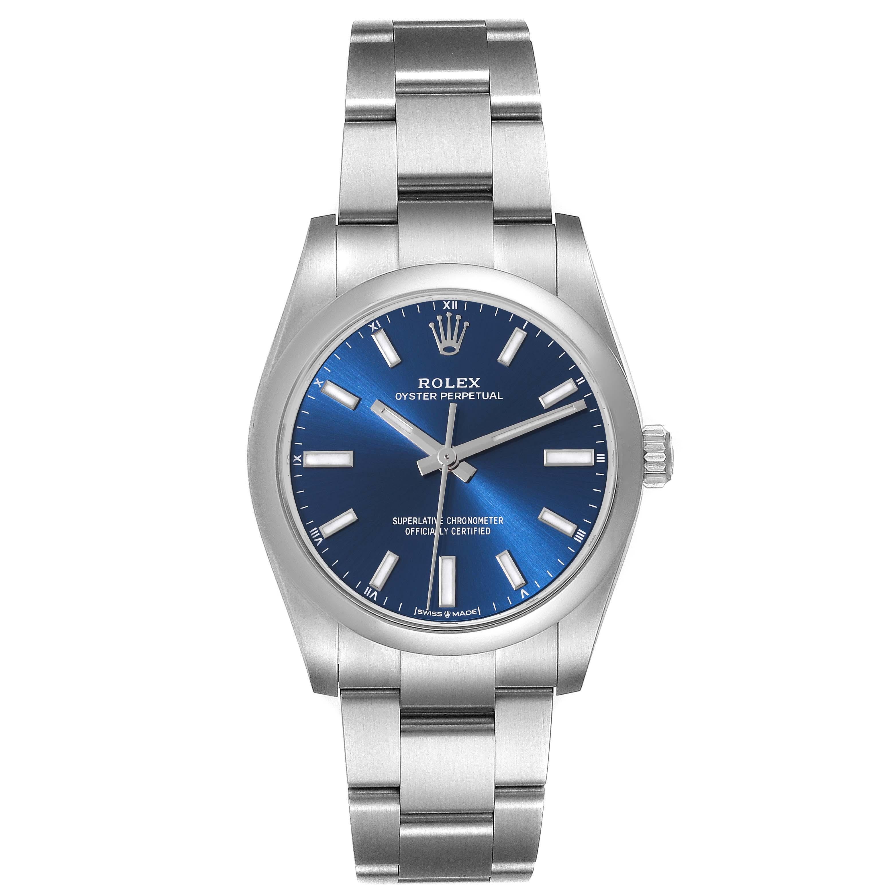 Rolex Oyster Perpetual 34mm Blue Dial Steel Mens Watch 124200 Box Card. Officially certified chronometer self-winding movement. Stainless steel case 34 mm in diameter. Rolex logo on a crown. Stainless steel smooth domed bezel. Scratch resistant
