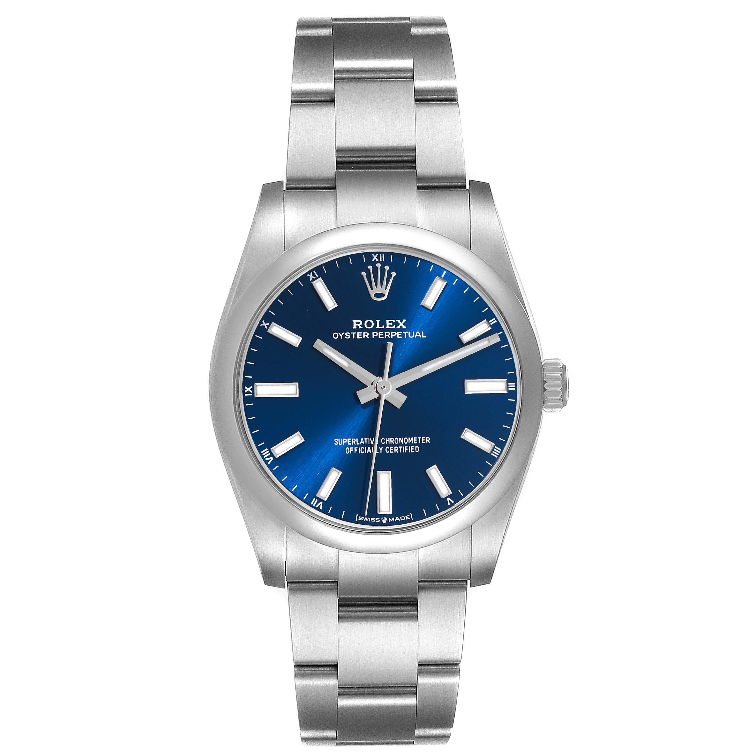 Rolex Oyster Perpetual 34mm Blue Dial Steel Mens Watch 124200 Box Card. Officially certified chronometer automatic self-winding movement. Stainless steel case 34 mm in diameter. Rolex logo on a crown. Stainless steel smooth domed bezel. Scratch