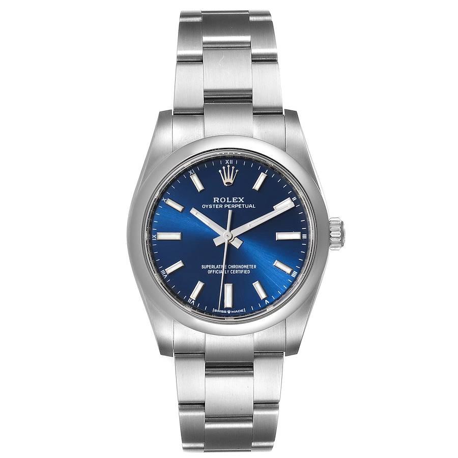 Rolex Oyster Perpetual 34mm Blue Dial Steel Mens Watch 124200 Unworn. Officially certified chronometer self-winding movement. Stainless steel case 34 mm in diameter. Rolex logo on a crown. Stainless steel smooth domed bezel. Scratch resistant