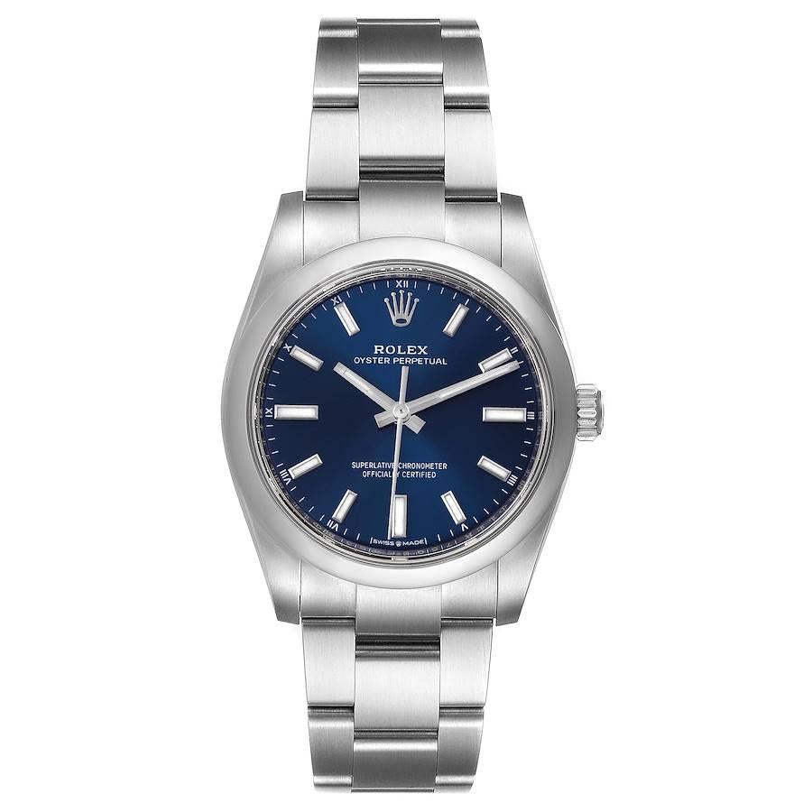 Rolex Oyster Perpetual 34mm Blue Dial Steel Mens Watch 124200 Unworn. Officially certified chronometer self-winding movement. Stainless steel case 34 mm in diameter. Rolex logo on a crown. Stainless steel smooth domed bezel. Scratch resistant