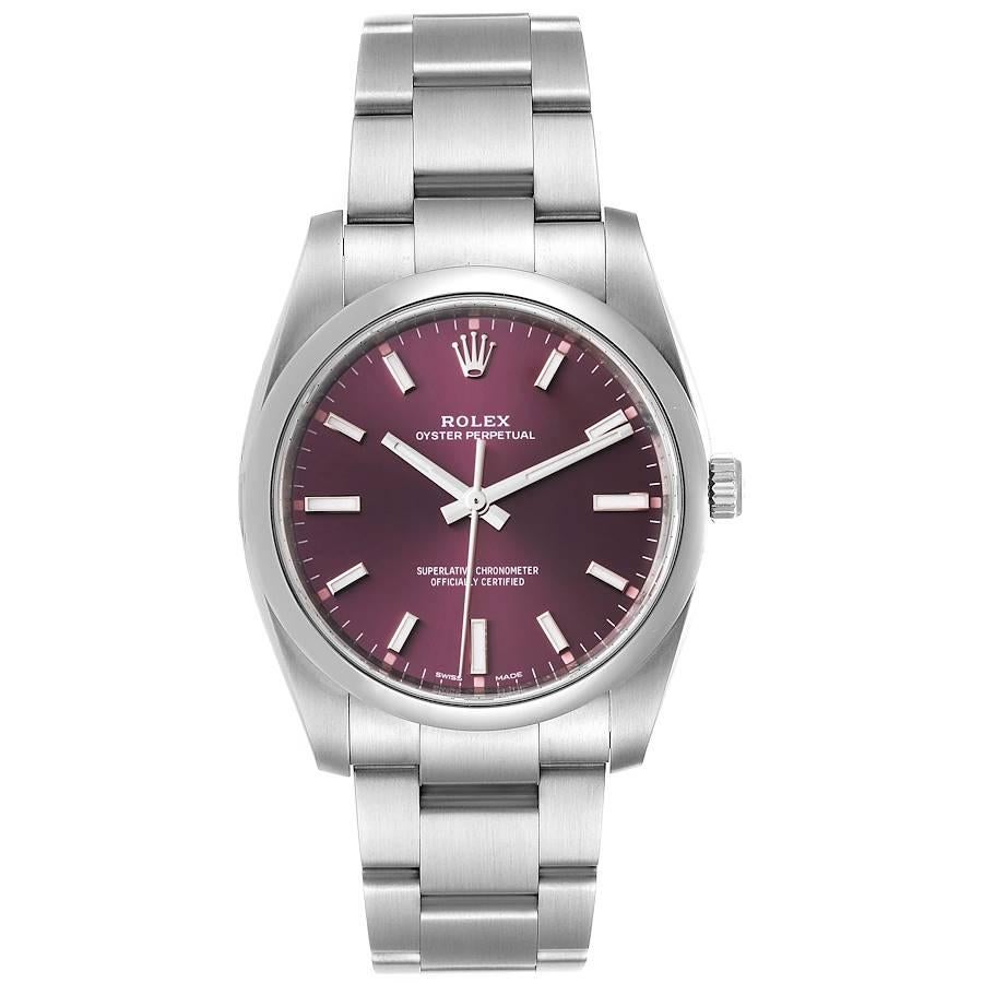 Rolex Oyster Perpetual 34mm Red Grape Dial Mens Watch 114200 Box Card. Officially certified chronometer self-winding movement. Stainless steel case 34 mm in diameter. Rolex logo on a crown. Stainless steel smooth domed bezel. Scratch resistant