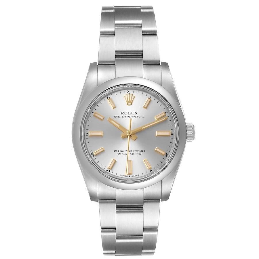 Rolex Oyster Perpetual 34mm Silver Dial Steel Mens Watch 124200 Box Card. Officially certified chronometer self-winding movement. Stainless steel case 34 mm in diameter. Rolex logo on a crown. Stainless steel smooth domed bezel. Scratch resistant