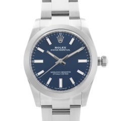 Rolex Oyster Perpetual Steel Blue Dial Automatic Midsize Watch 124200