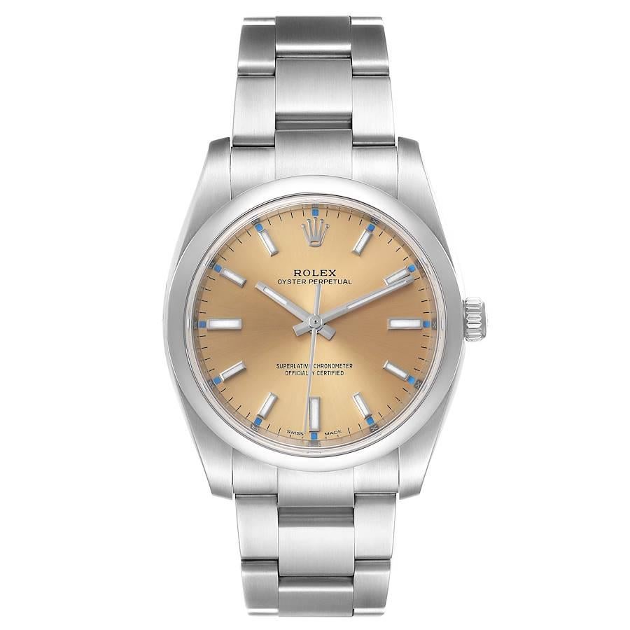Rolex Oyster Perpetual 34mm White Grape Dial Steel Mens Watch 114200 Unworn. Officially certified chronometer self-winding movement. Stainless steel case 34.0 mm in diameter.  Rolex logo on a crown. Stainless steel smooth domed bezel. Scratch