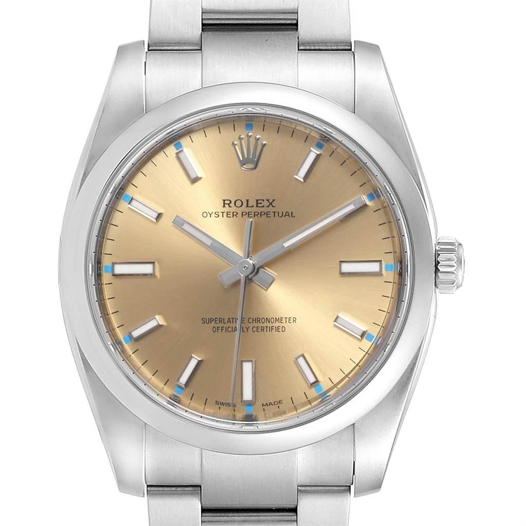 Rolex Oyster Perpetual 34mm White Grape Dial Steel Watch 114200 Unworn. Officially certified chronometer self-winding movement. Stainless steel case 34.0 mm in diameter.Rolex logo on a crown. Stainless steel smooth domed bezel. Scratch resistant