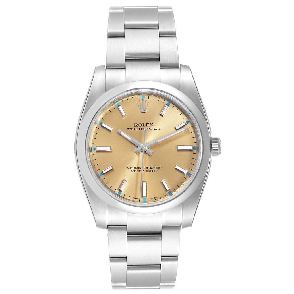 Rolex Oyster Perpetual 34mm White Grape Dial Steel Watch 114200 Unworn. Officially certified chronometer self-winding movement. Stainless steel case 34.0 mm in diameter. Rolex logo on a crown. Stainless steel smooth domed bezel. Scratch resistant