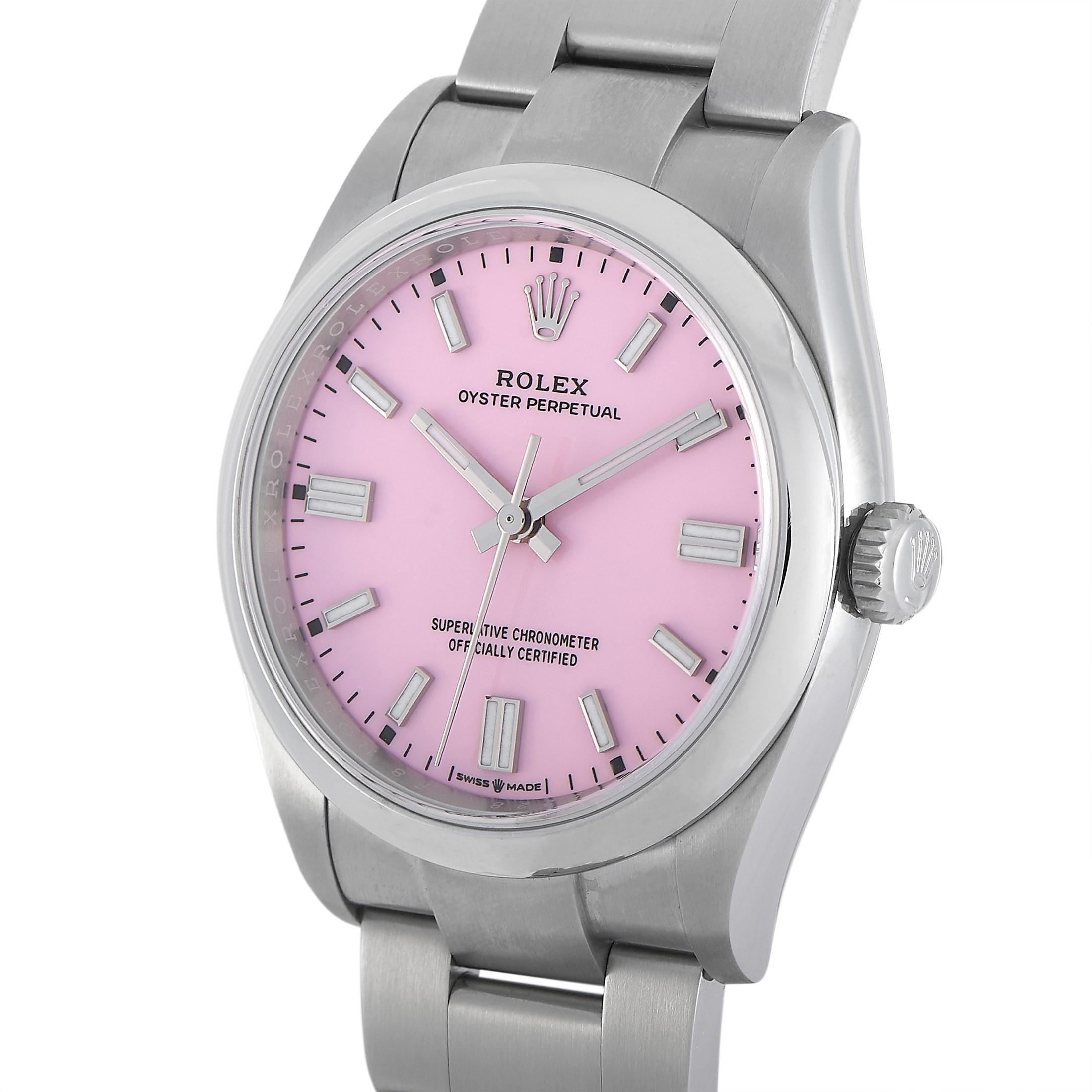 Rolex' quiet classic gets a vibrant update. This Rolex Oyster Perpetual 36 Candy Pink Watch 12600 is a simple time-only watch that now has an interesting look. It features a beautiful pastel yet bright pink dial on an extremely robust 36mm