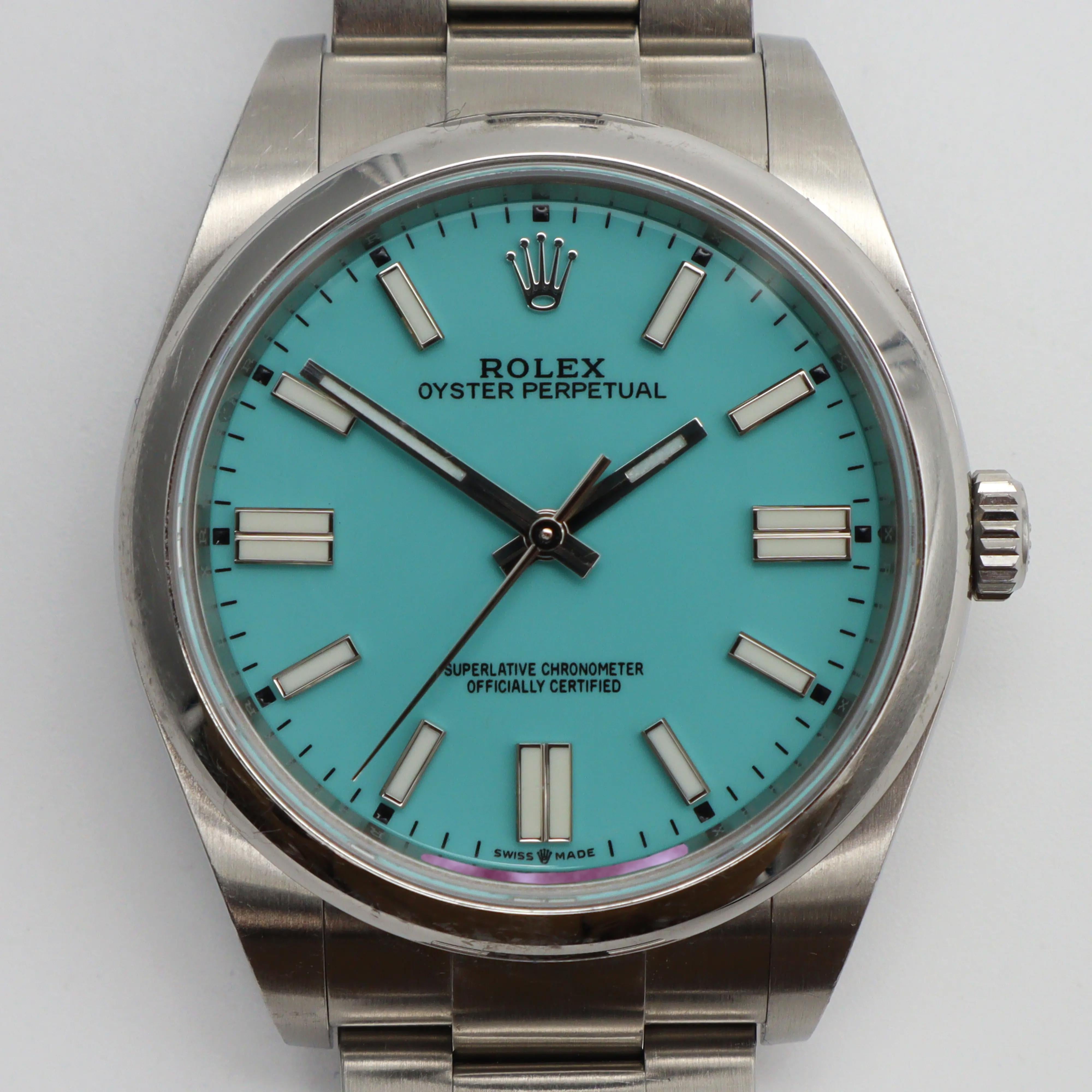 Pre-owned. Comes with an original box and paper. Custom Aftermarket Turquoise Dial


Brand & Model
Brand: Rolex
Model: Oyster Perpetual 116000
General Characteristics

Type: Wristwatch
Department: Men
Style: Luxury
Vintage: No
Customized: