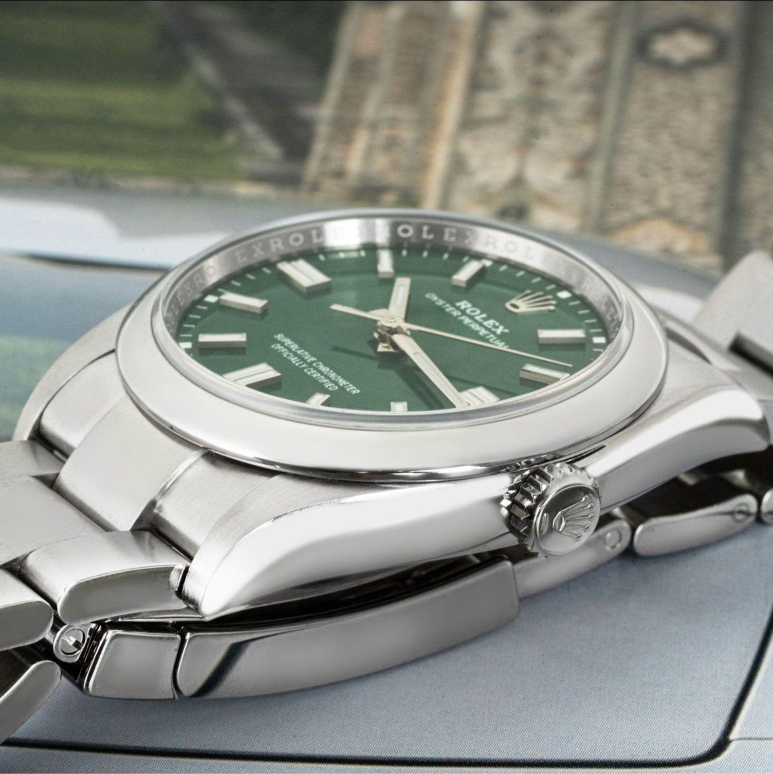 A 36mm Oyster Perpetual crafted in steel by Rolex. Featuring a green dial with applied hour markers and smooth stainless steel bezel. Fitted with scratch-resistant sapphire crystal, a self-winding automatic movement and an Oyster bracelet equipped