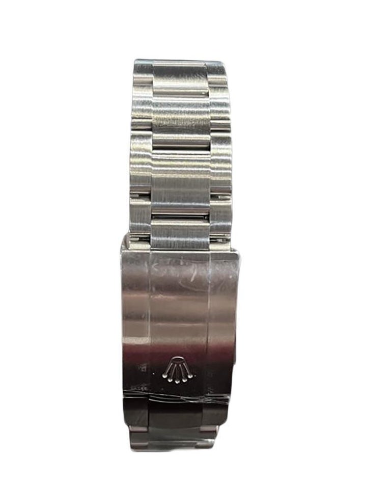 Rolex Oyster Perpetual Rhodium Blue Dot Dial REF 114300 For Sale at 1stDibs