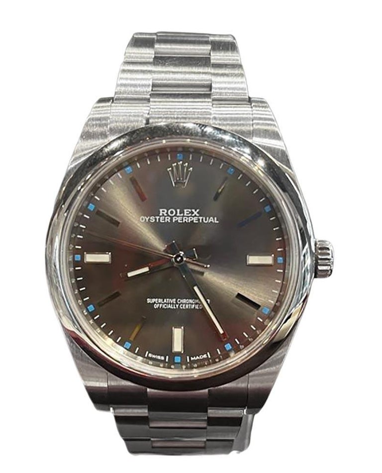 Rolex Oyster Perpetual Rhodium Blue Dot Dial REF 114300 For at 1stDibs | rolex rolex style number, 114300