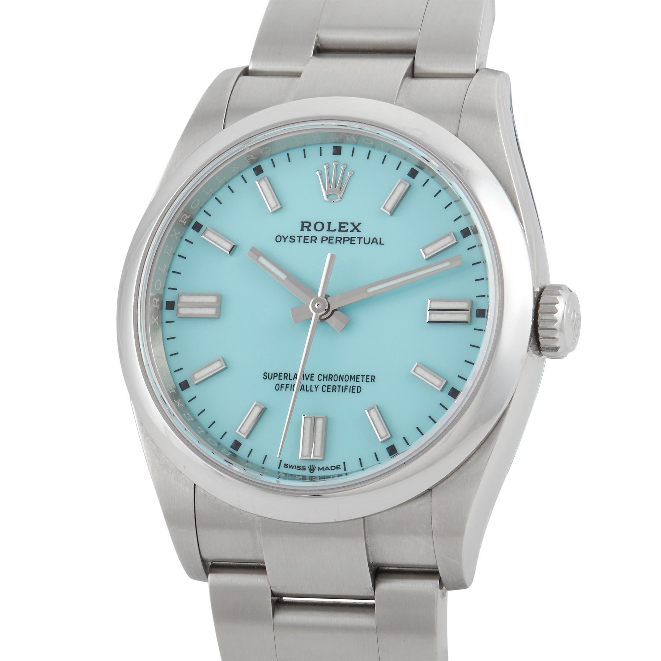 The Rolex Oyster Perpetual Watch, reference number 126000, perfectly pairs luxury with a bold pop of color. 

This watch’s 36mm case and bracelet are both crafted from opulent Oystersteel. Minimalist details like simple luminous index markers and