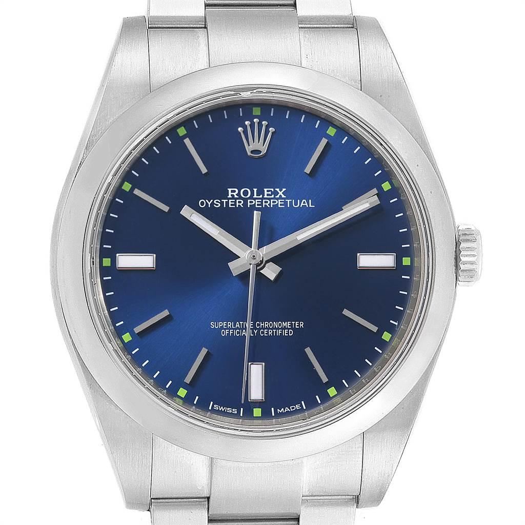 Rolex Oyster Perpetual 39 Blue Dial Steel Mens Watch 114300 Box Card. Officially certified chronometer self-winding movement. Stainless steel case 36 mm in diameter. Rolex logo on a crown. Stainless steel smooth domed bezel. Scratch resistant