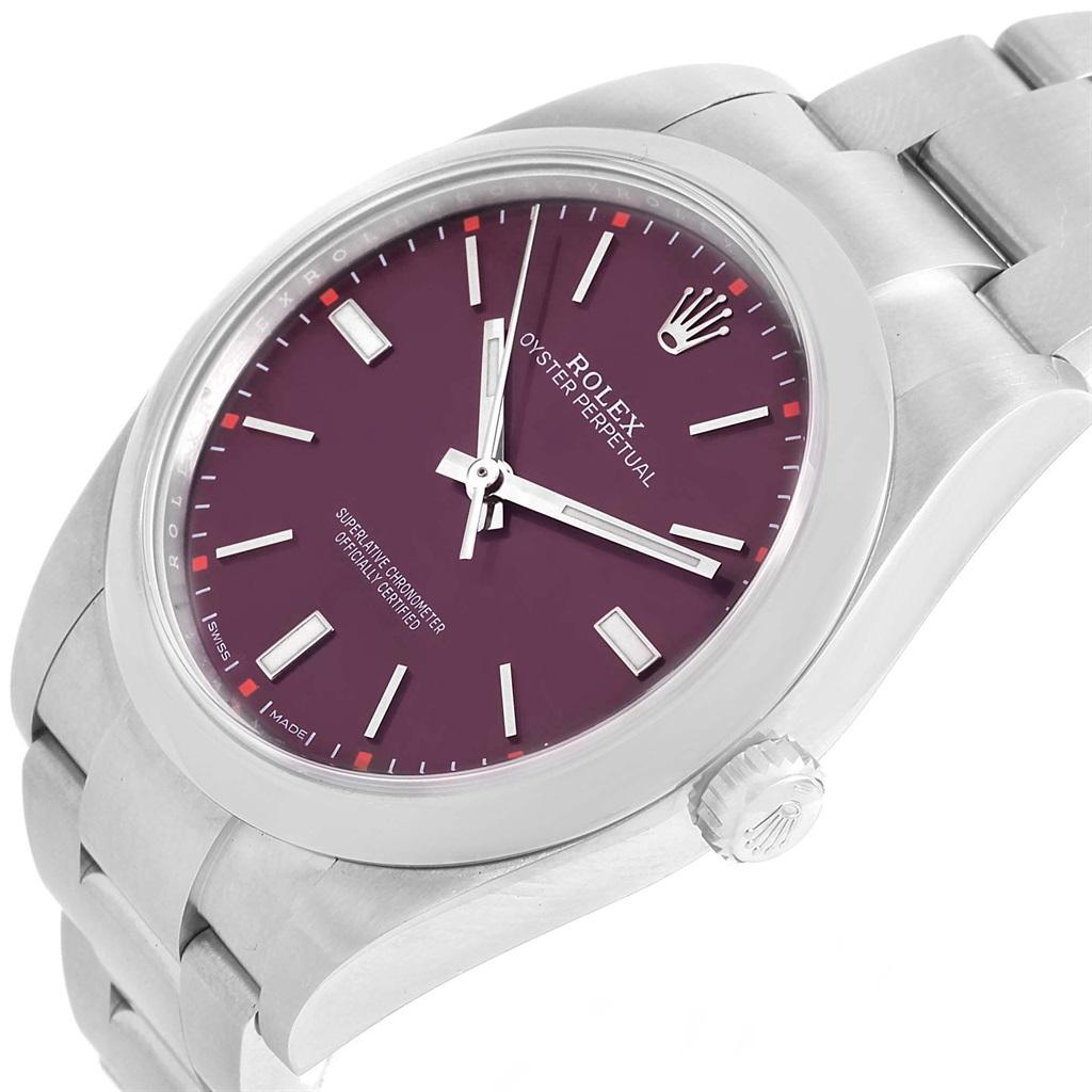 Rolex Oyster Perpetual 39 Red Grape Dial Steel Mens Watch 114300 Box. Officially certified chronometer automatic self-winding movement. Stainless steel case 39.0 mm in diameter. Rolex logo on a crown. Stainless steel smooth domed bezel. Scratch