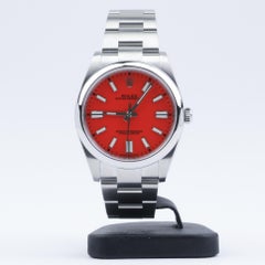 Rolex Oyster Perpetual Coral Red Dial 124300