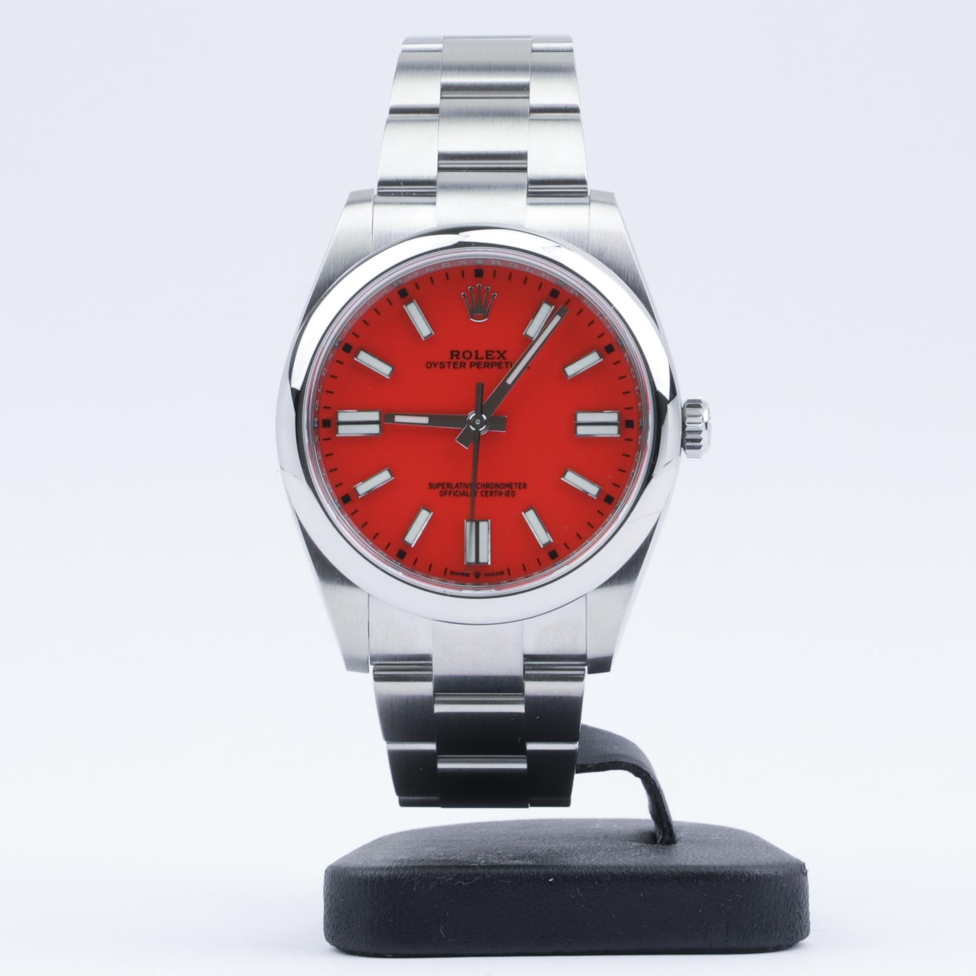 This Rolex Oyster Perpetual 41mm Coral Red Dial 124300 2021 is in overall excellent pre-owned condition. 

Comes with new card.

Rolex Oyster Perpetual 41 reference 124300 with “Coral Red” dial. This watch is 2021 model which features the new