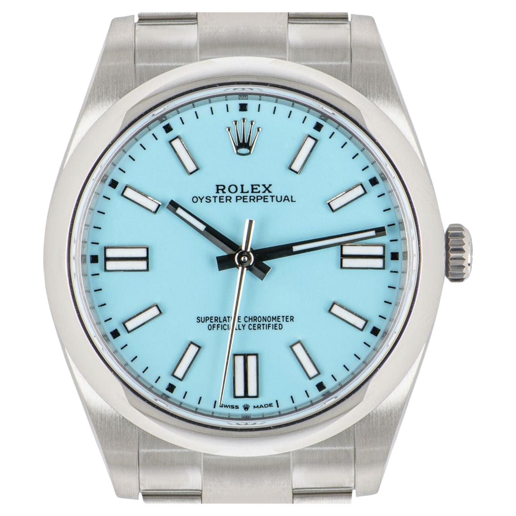 An unworn 41mm Oyster Perpetual in Oystersteel by Rolex. Featuring a smooth domed bezel and a turquoise blue dial reminiscent of Tiffany & Co.'s blue. The Oyster bracelet is equipped with a folding Oysterclasp which comes with the Easylink 5mm