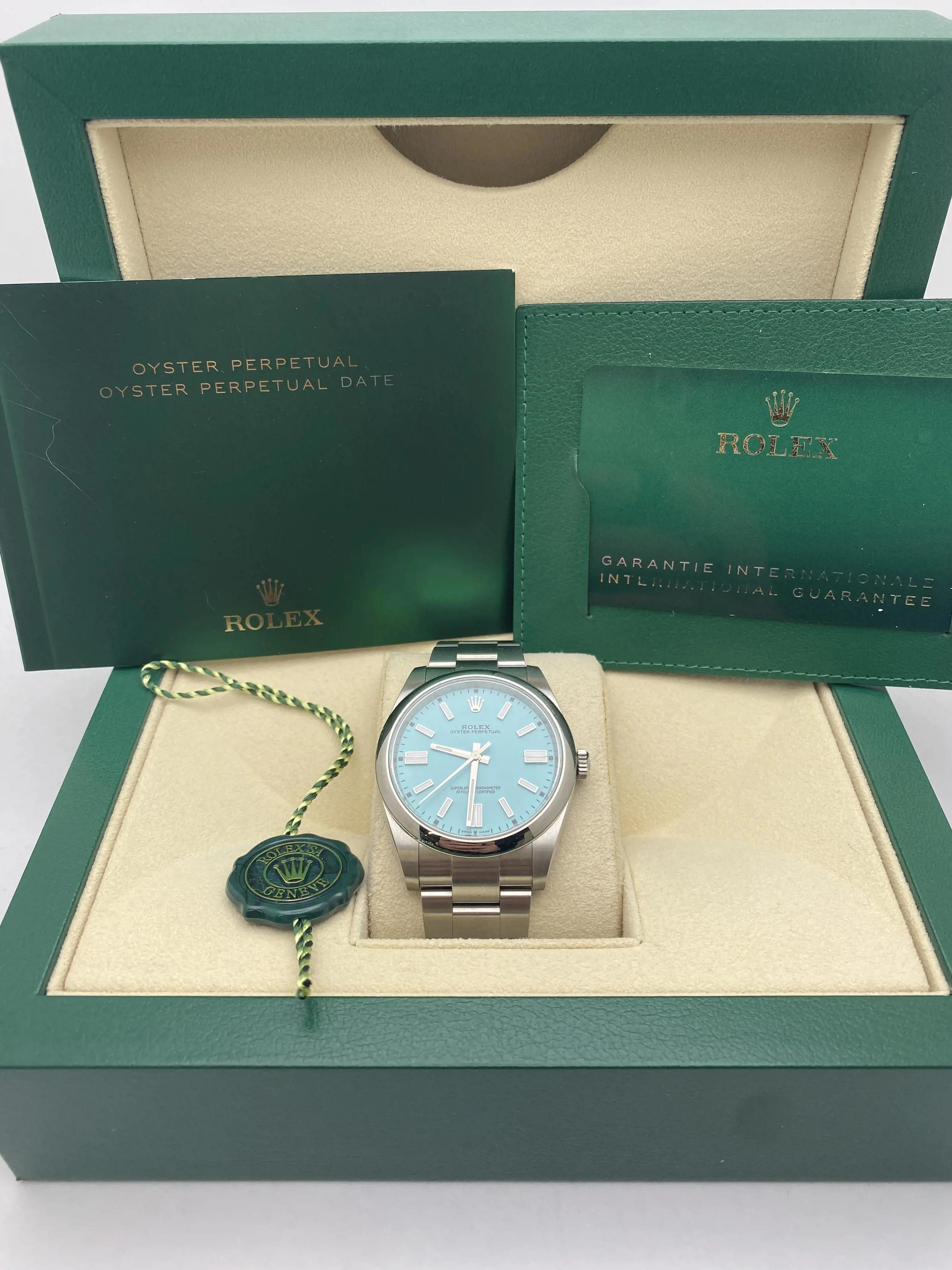 Authentische Original Rolex Oyster Perpetual 41, Referenz 124300. Uhr ist in tadellosem Zustand, mit einem benutzerdefinierten Türkis Zifferblatt für das ursprüngliche Zifferblatt ausgetauscht. Das Custom-Zifferblatt ist von hervorragender Qualität
