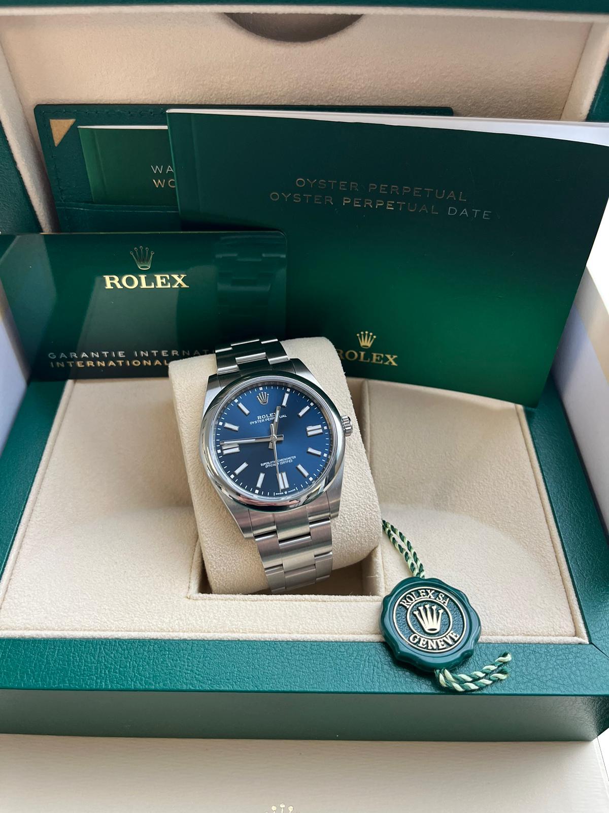 Rolex Oyster Perpetual 41mm Bright Blue Dial Stainless Steel Watch 124300 In New Condition For Sale In Aventura, FL