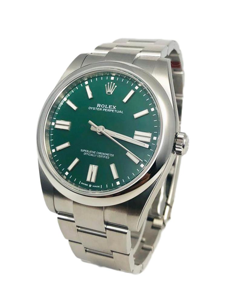 Brand: Rolex 

Model Name: Oyster Perpetual

Model Number: 124300

Movement: Automatic

Case Size: 41 mm

Case Back: Solid

Case Material:  Stainless Steel

Bezel: Stainless Steel   

Dial: Green

Bracelet: Stainless Steel

Hour Markers: