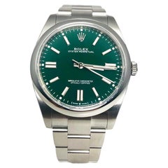Rolex Oyster Perpetual Green Dial Ref. 124300