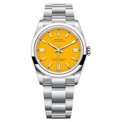 Rolex Oyster Perpetual Stainless Steel Yellow Dial Oyster Watch 124300