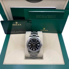 Nuevo reloj Rolex Oyster Perpetual de 41 mm de acero y esfera negra con cúpula 124300