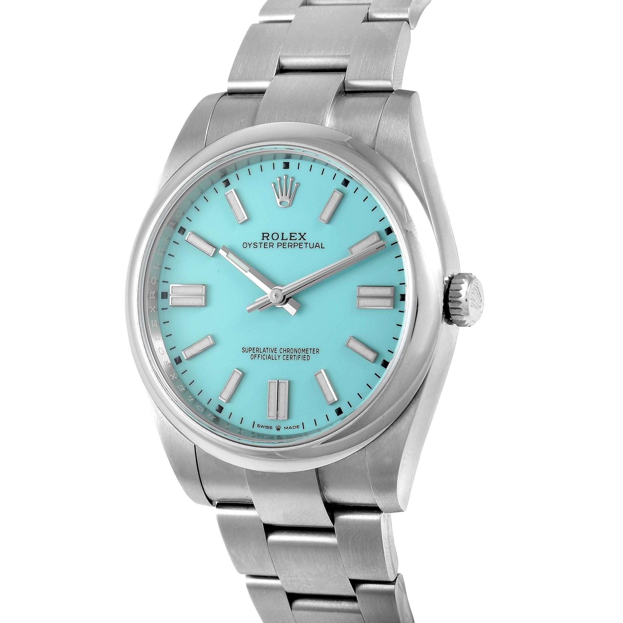 This Rolex watch, reference number 124300, features a white oystersteel case that measures 41 mm in diameter. The case is presented on a matching white oystersteel bracelet with a deployment clasp, highlighting the beautiful blue dial which displays