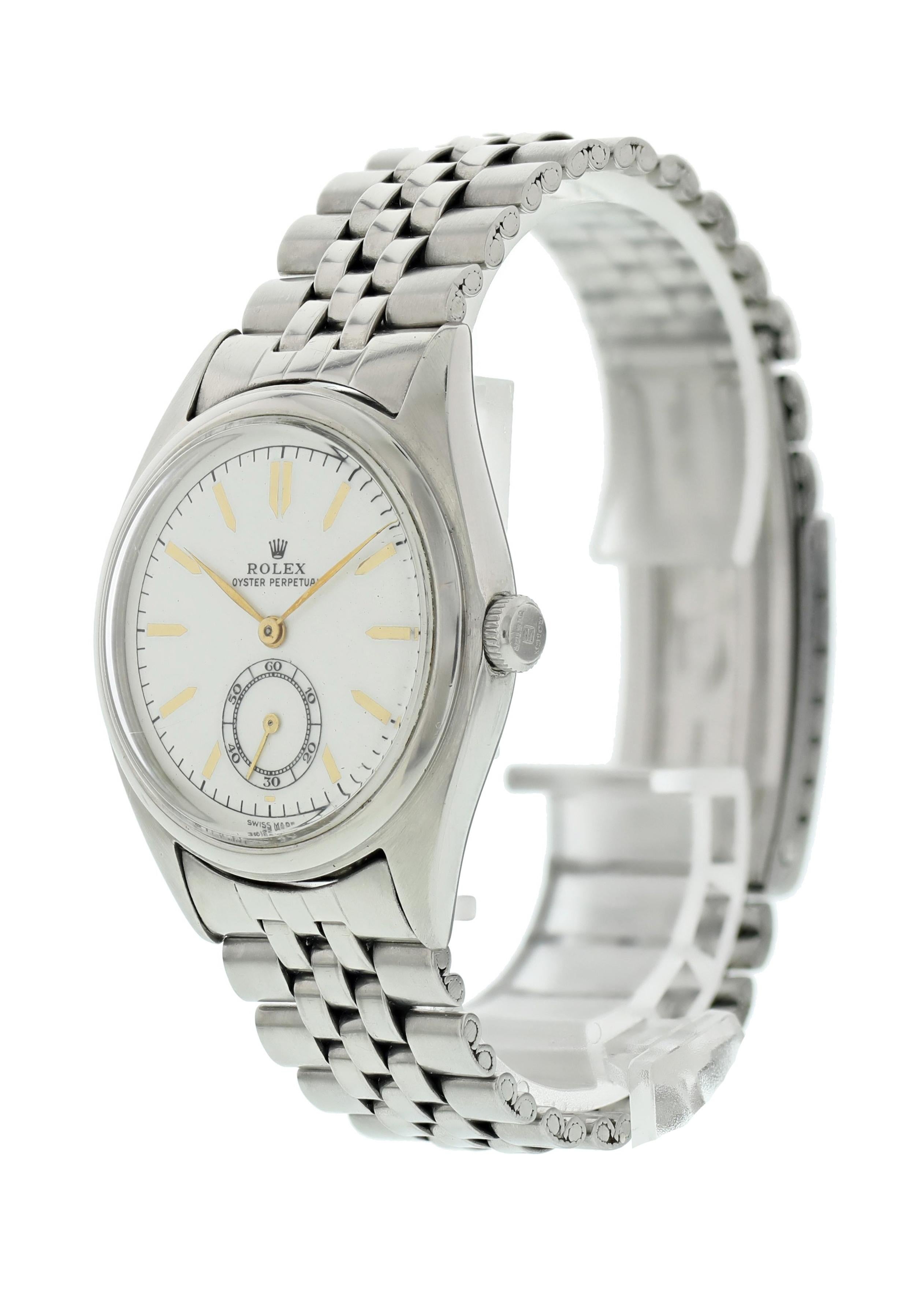 Rolex Oyster Perpetual 5026 Bubble Back  Men's Watch. 36mm stainless steel case with smooth bezel. Rare white gloss dial with gold hands and indexes. Small seconds subdial Minute markers on the outer dial. 19mm jubilee bracelet with a fold over
