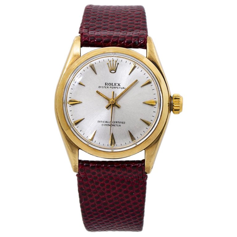 Rolex Oyster Perpetual 6048 Silver Dial 14K Yellow Gold Watch at 1stDibs