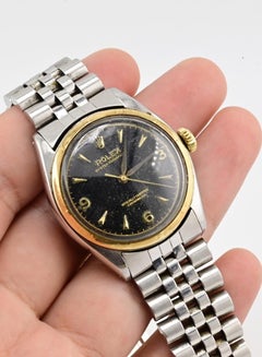 Rolex Oyster Perpetual 6085 Black Dial Stainless Steel & Gold Bezel Automatic