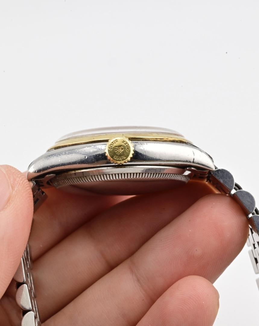 Femenino o masculino Rolex Oyster Perpetual 6085 Esfera Negra Acero Inoxidable y Bisel Dorado Automático en venta