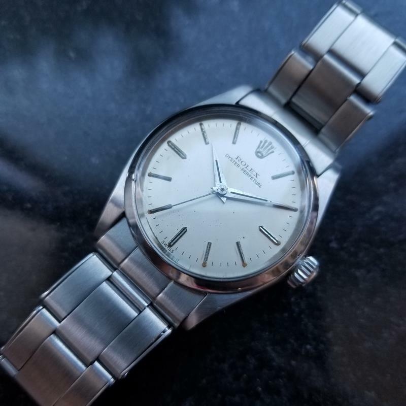 Luxury icon, midsize Rolex Oyster Perpetual 6548 all-stainless steel automatic, c.1958, all original. Verified authentic by a master watchmaker. Original, unrestored Rolex silver dial, applied silver baton hour markers, silver minute and hour hands,