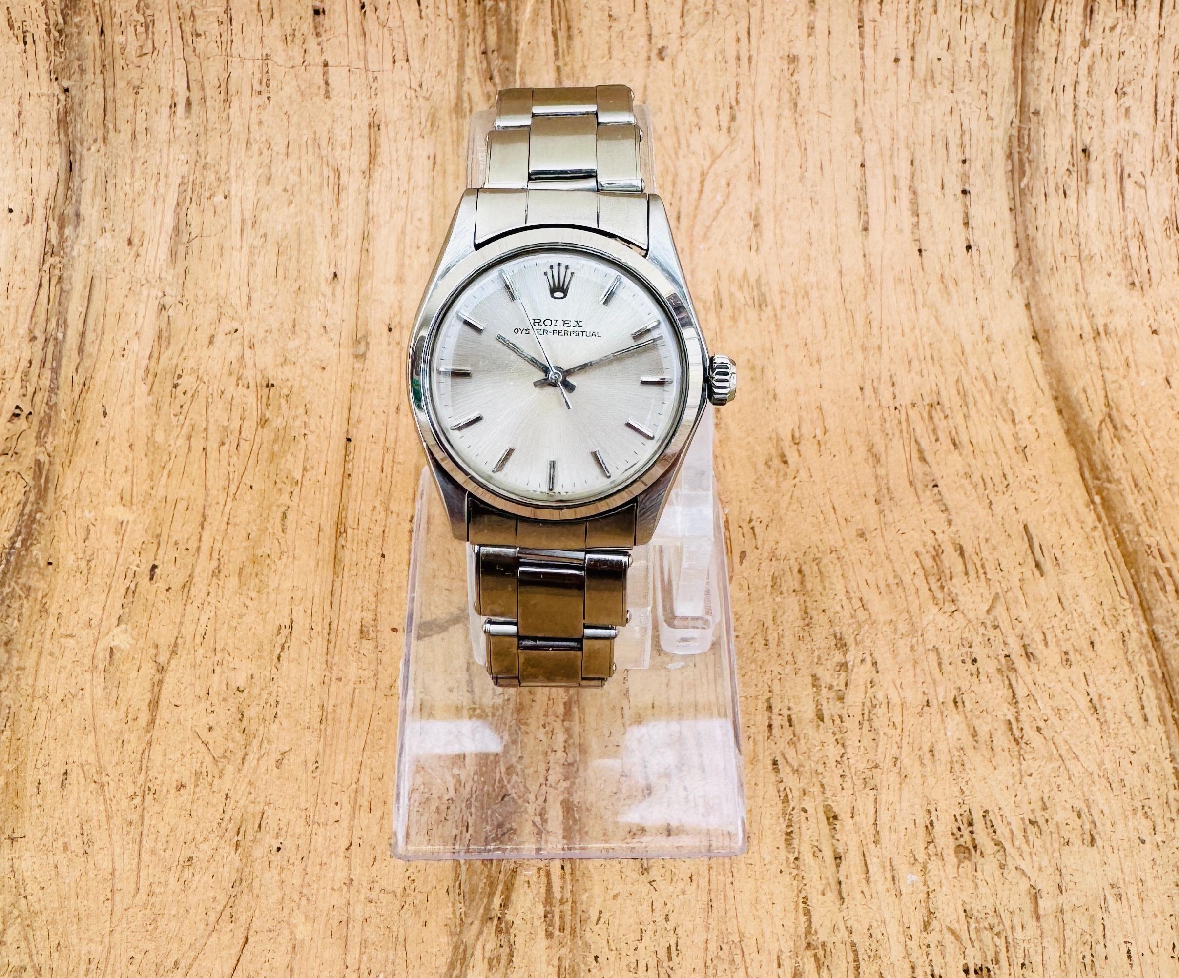 escription
Brand: Rolex

Model: Oyster Perpetual

Reference Number: 6549

Country Of Manufacture: Switzerland

Movement: automatic

Case Material: Stainless Steel

Measurements : Case width: 31mm. (without crown)

Band Type : Stainless Steel

Band