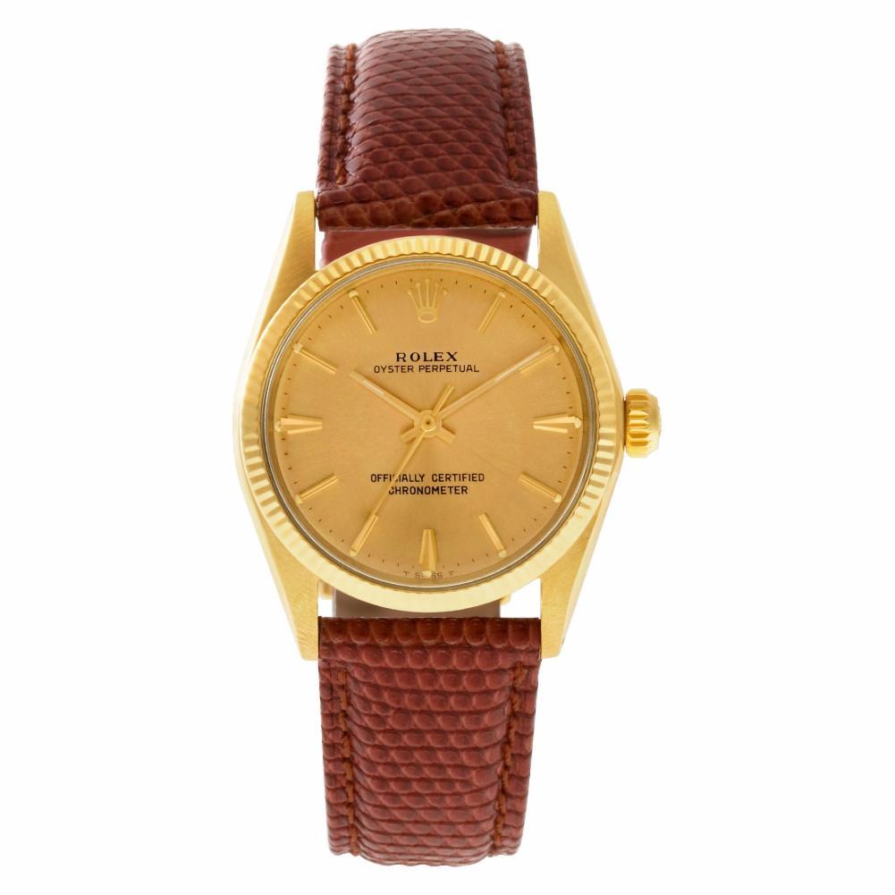 Rolex Oyster Perpetual Reference #:6551. Vintage and rare! Rolex Oyster Perpetual in 14k on brown lizard strap.. Auto w/ sweep seconds. Ref 6551. Circa 1959 Fine Pre-owned Rolex Watch. Certified preowned Rolex Oyster Perpetual 6551 watch is made out